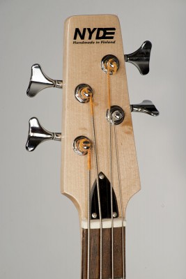 The headstock with 2L2R sealed tuners and my logo
