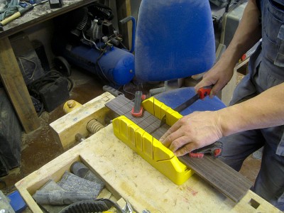 I cut the fret slots using a miter box and a rip saw.