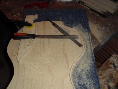 11 Using surform rasps and file to shape the body.JPG