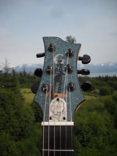 &quot;arctic Mariner&quot;<br />A bent stock anchor and broken chain.<br />Arctic rose scrim shawed into truss rod cover (solid surface)