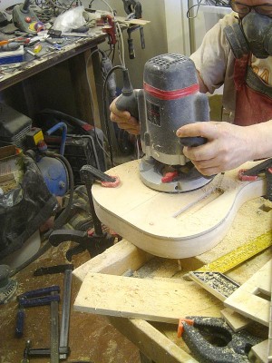 Routing pickup cavities using the template.