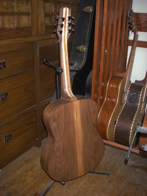 this is the back of a 3/4 size walnut steel string.