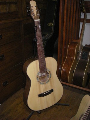 this is a 3/4 size steel string walnut