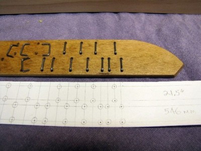 The fretboard is made of 1/4&quot; maple.  The unique frets are staples made from .055&quot; steel wire and are glued into predrilled holes.  The nuts and bridges are also steel wire staples.
