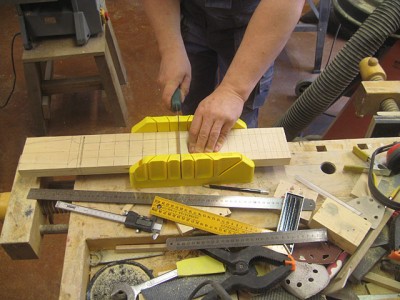 Cutting fret slots with a mitre box and a dozuki saw.