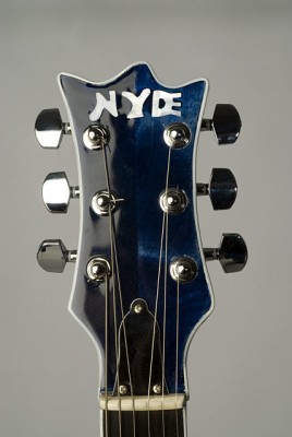 a close-up of the headstock with my logo