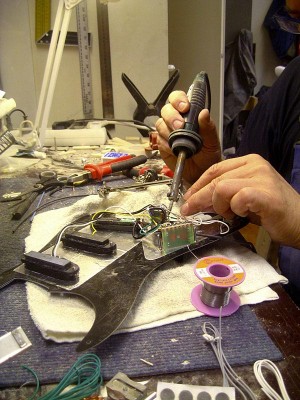 Soldering together the pickups and the controls.