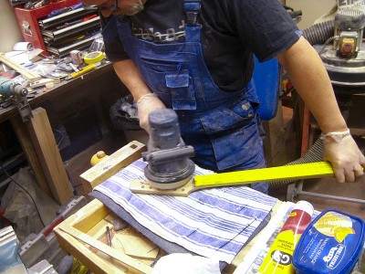 Polishing the neck with a random orbital sander, a sponge buffer and Farécla G3 paste.