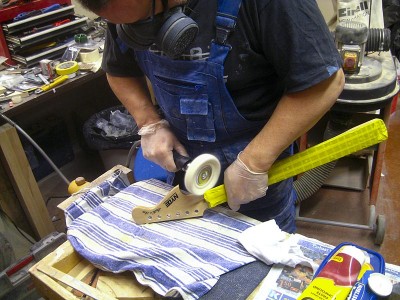 Polishing the tricky spots with a rag wheel.