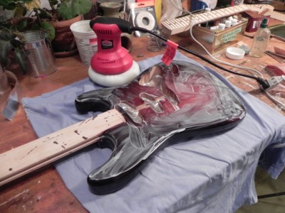 I've got 8-9 coats of Deft brushable lacquer on at this point and I've sanded it down flat to start the polishing process.