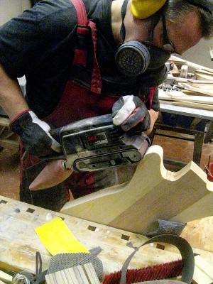 Sanding the sides of the body here. I drew the shape directly on the blank and cut it out with a bandsaw.