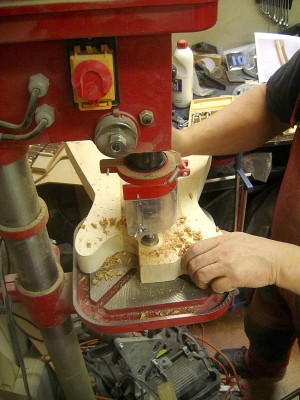 Prior to routing the neck pocket I removed the excess wood with a drill press and a forstner bit.