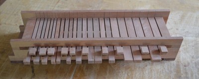 The keys with the added bits; to lift the level of the keypads in the case of the semitone keys, and to add a bit more of a gluing surface in the case of a few really thin diatonic keys
