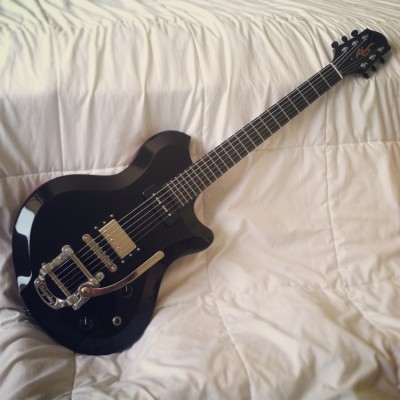 Oceana DuoTone in gloss black top with satin back.