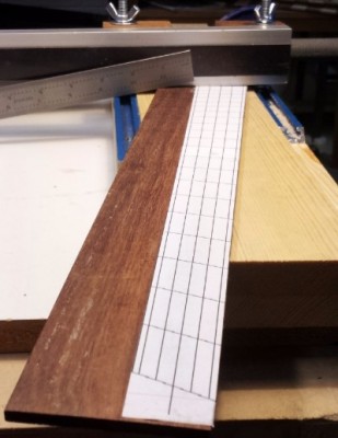 Check to see that the paper template is straight on the workpiece.