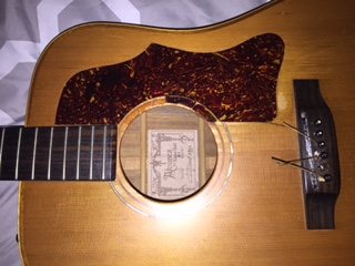 The pickguard is coming up in spots, has cracked in spots and is wavy in spots. I think it needs to be removed and replaced because I do not want it to crack the sound board.