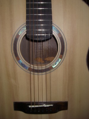 close up of the walnut steel string